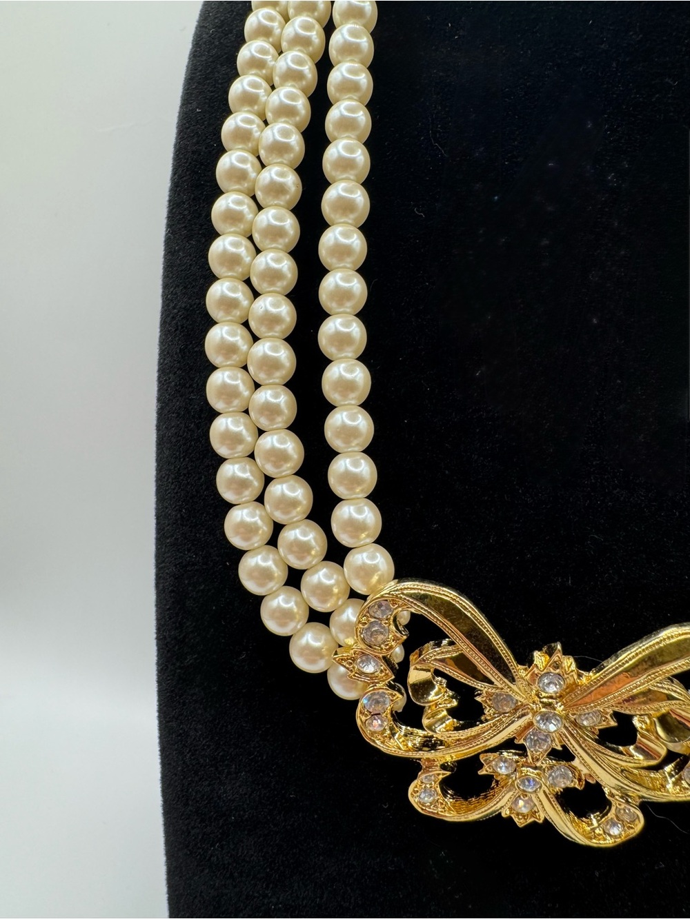 Pearl Triple-Strand Necklace with Gold Butterfly Accent - Picture 3 of 6